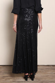 Model Maddiec wearing size 10 of the Remy Sequin Skirt – Black in colour Black, from the front
