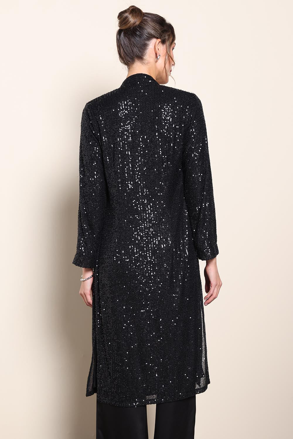 Model Maddiec wearing size 10 of the Reece Sequin Jacket – Black in colour Black, from the front