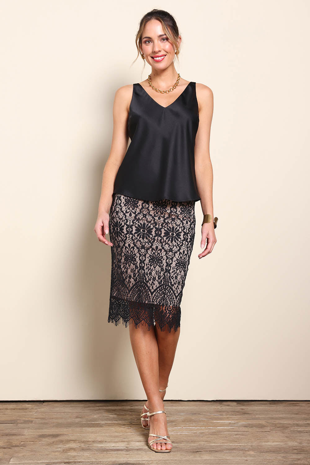 Model Maddiec wearing size 10 of the Kiki Lace Skirt - Black in colour Black, from the front