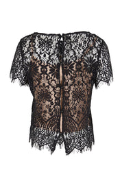 Product shot of the Kiki Lace Top - Black in colour Black, from the back