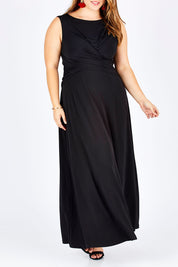Model Sophie wearing size 14 of the Alexa Dress in colour Black (Black), from the front, cropped image