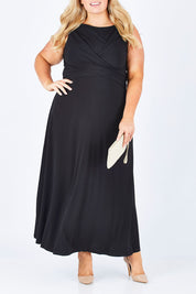 Model Sophie wearing size 18 of the Alexa Dress in colour Black (Black), from the front, cropped image