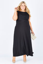 Model Sophie wearing size 18 of the Alexa Dress in colour Black (Black), from the front, showing the whole outfit