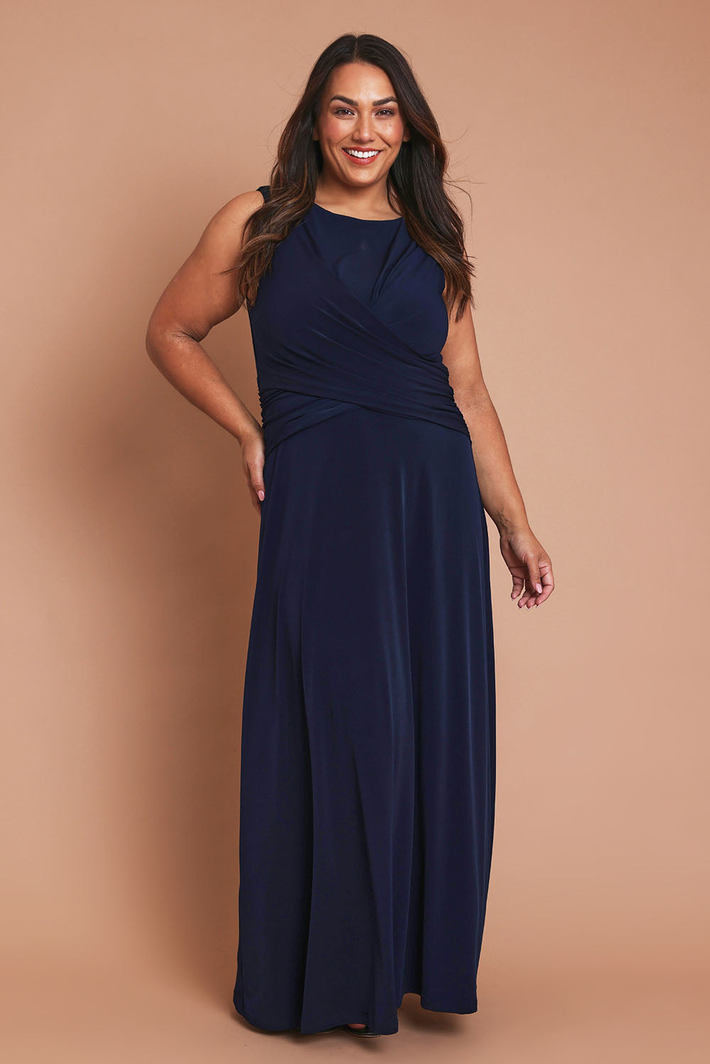 Model Ashleigh wearing size 16 of the Alexa Dress in colour Navy (Blue), from the front, showing the whole outfit