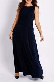 Model Jessica wearing size 14 of the Alexa Dress in colour Navy (Blue), from the front, cropped image