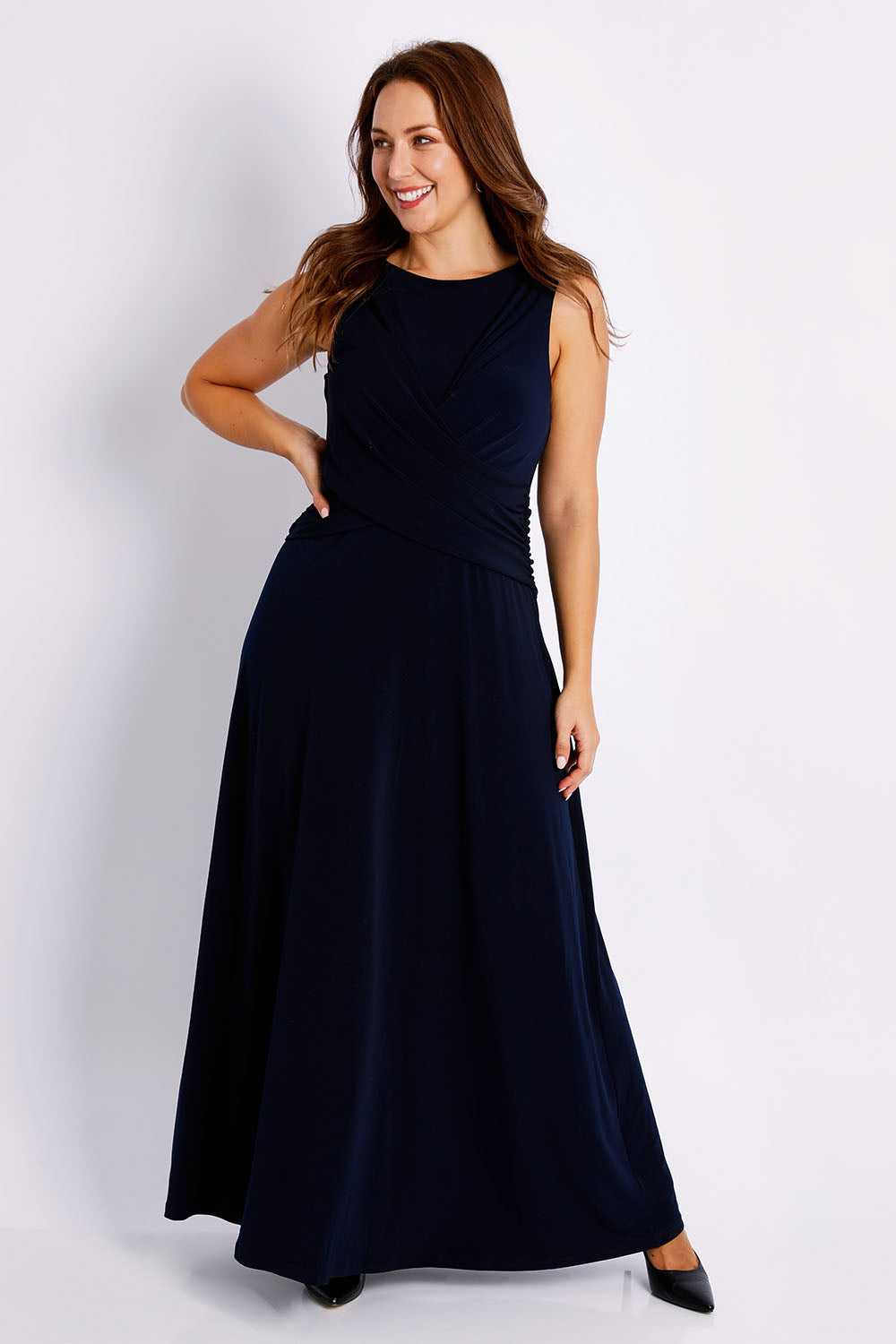 Model Jessica wearing size 14 of the Alexa Dress in colour Navy (Blue), from the front, showing the whole outfit