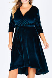 Model Fiona wearing size 16 of the Annabelle Dress in colour Opal (Blue), from the front, cropped image