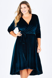Model Fiona wearing size 16 of the Annabelle Dress in colour Opal (Blue), from the front, cropped image