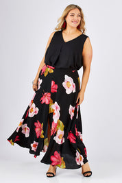 Model Ljubenka wearing size 18 of the Hannah Skirt in colour Goddess (Black), from the front, showing the whole outfit