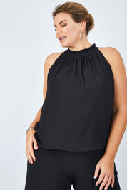 Model Fiona wearing size 16 of the Liz Top in colour Black (Black), from the front, cropped image