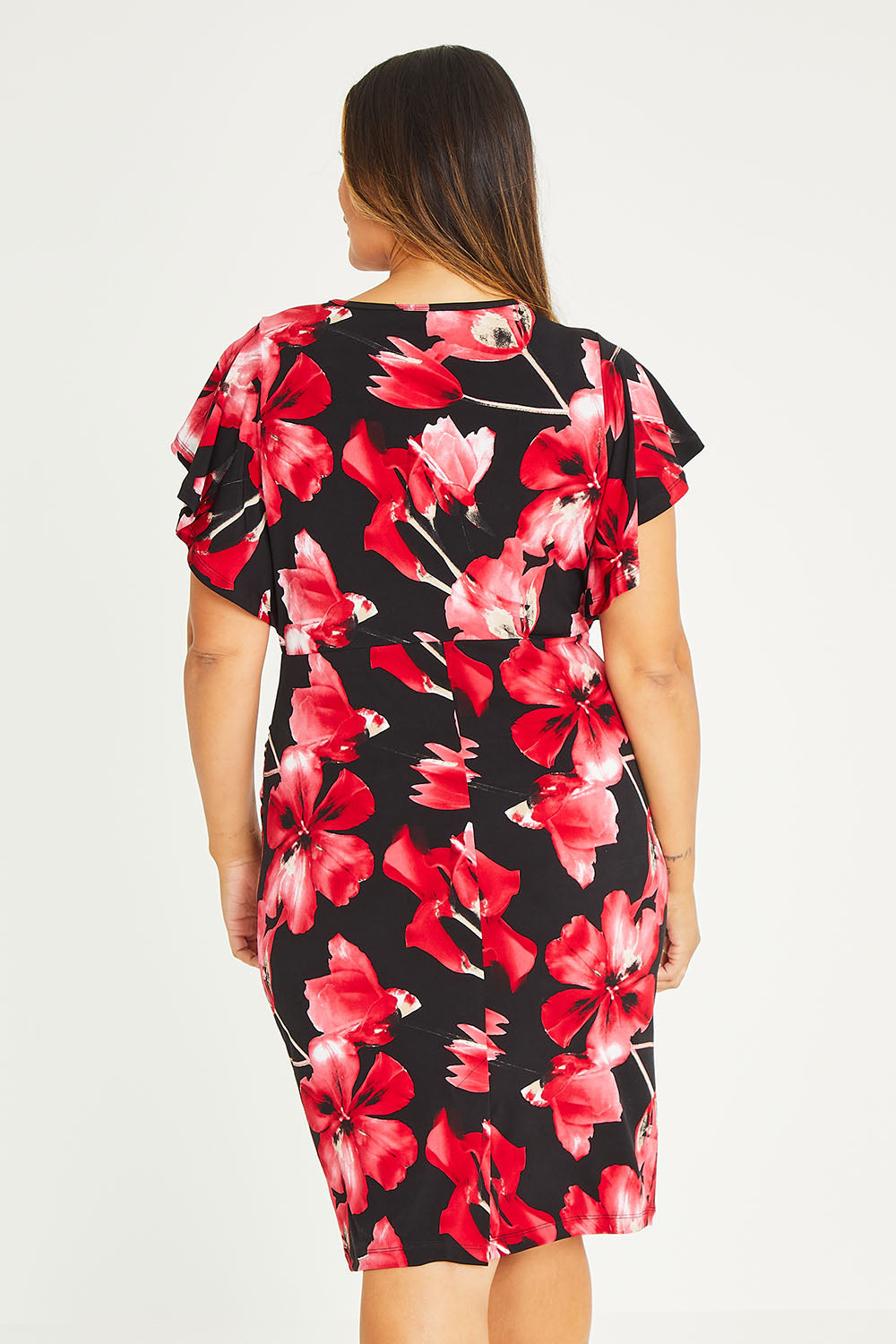 Model Palatina wearing size 16 of The Printed Anna Dress in colour Scarlet (Red), from the back