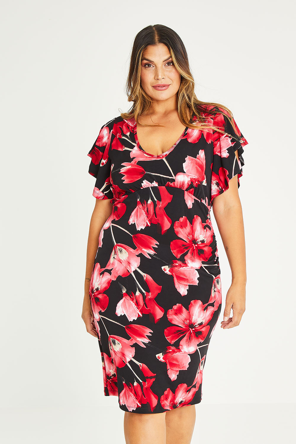 Model Palatina wearing size 16 of The Printed Anna Dress in colour Scarlet (Red), from the front, cropped image