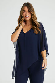 Model Laura wearing size 14 of the Marie Top in colour Navy (Blue), from the front, cropped image