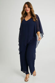 Model Laura wearing size 14 of the Marie Top in colour Navy (Blue), from the front, showing the whole outfit