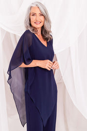 Model Luisa wearing size 10 of the Marie Top in colour Navy (Blue), from the front, showing the whole outfit