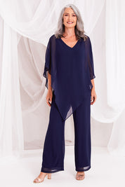Model Luisa wearing size 10 of the Marie Top in colour Navy (Blue), from the front, showing the whole outfit