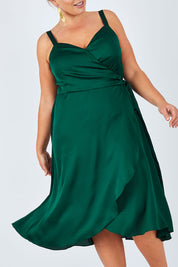 Model Fiona wearing size 16 of the Amy Dress in colour Envy (Green), from the front, cropped image