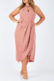 Model Fiona wearing size 16 of the Adriana Dress in colour Camelia (Pink), from the front, cropped image