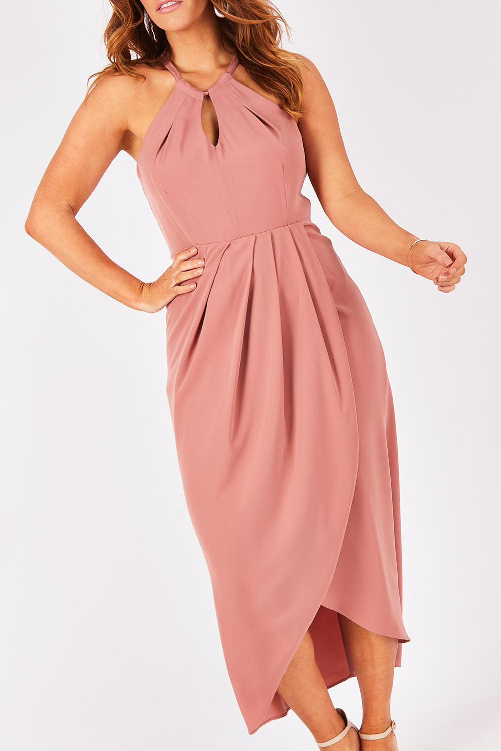 Model Laura wearing size 12 of the Adriana Dress in colour Camelia (Pink), from the front, cropped image