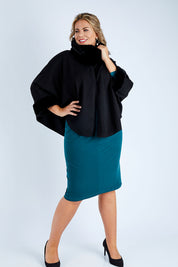 Model Fiona wearing size OneSize of the Brigitte Cape in colour Black (Black), from the front, showing the whole outfit