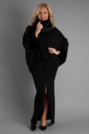 Model Sandy wearing size OneSize of the Brigitte Cape in colour Black (Black), from the front, showing the whole outfit