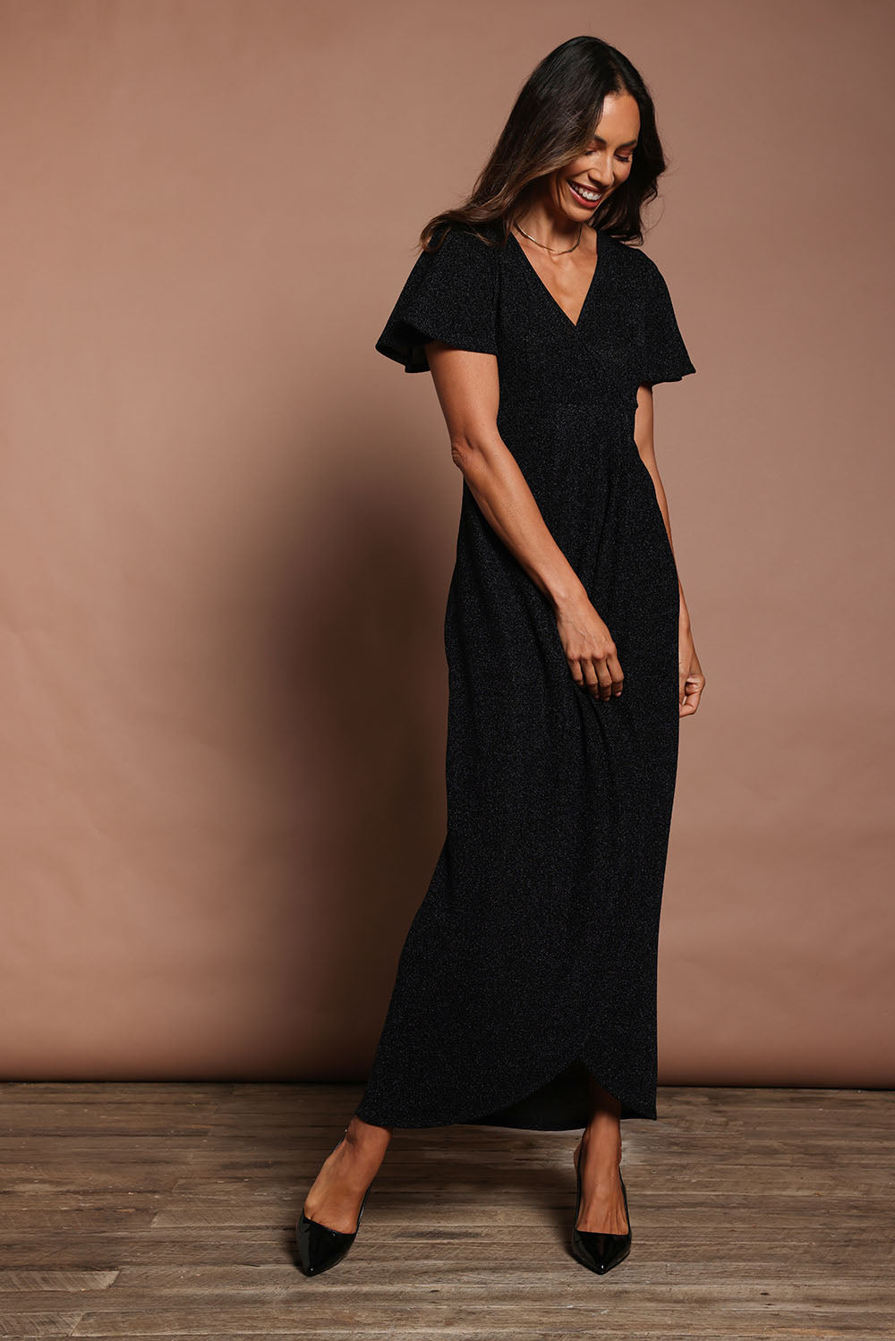 Model Amanda wearing size 10 of the Piper Dress in colour Black (Black), from the front, showing the whole outfit