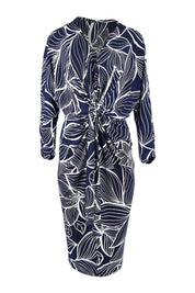 Product shot of The Printed Nancy Dress in colour Navyleaves (Blue), from the front