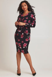 Model Terri-Leigh wearing size 14 of The Printed Nancy Dress in colour Roses (Black), from the front, showing the whole outfit