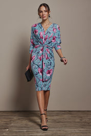 Model Madeline wearing size 10 of The Printed Nancy Dress in colour Windflower, from the front, showing the whole outfit