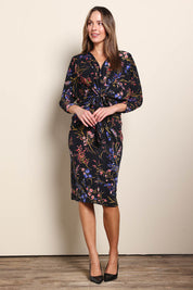 Model Maddiec wearing size 10 of the The Printed Nancy Dress – Floral in colour Floral, from the front
