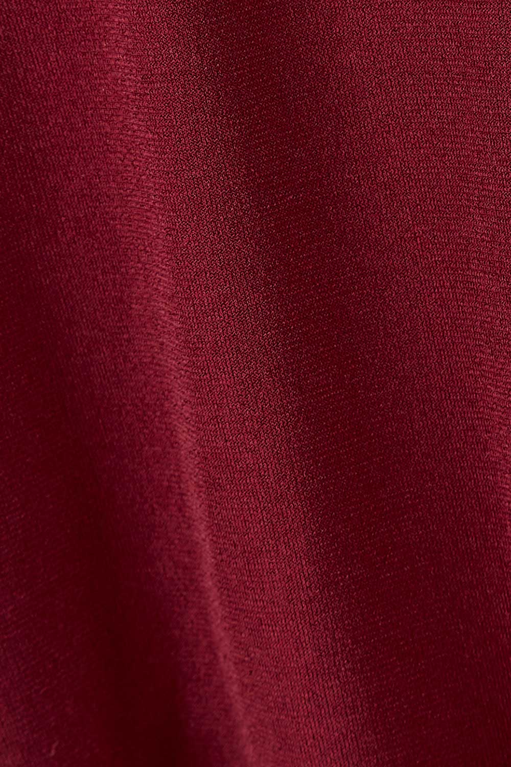 Product shot of the Nancy Dress in colour Port (Red), detail