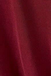 Product shot of the Nancy Dress in colour Port (Red), detail