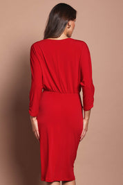 Model Madeline wearing size 10 of the Nancy Dress in colour Red (Red), from the back