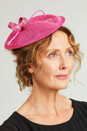 Model Emma wearing size OneSize of the Zeya Fascinator in colour Hotpink (Pink), from the front, showing the whole outfit