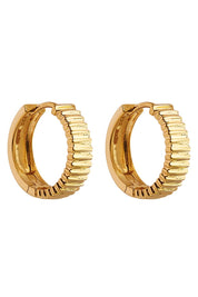 Product shot of the Raya Huggie Earring in colour Gold (Metallics), from the front