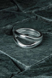 A model wearing the Creation Silver Ring in colour Silver (Metallics), from the front, showing the whole outfit