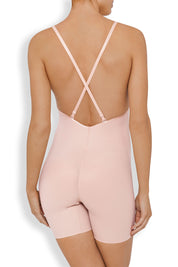 A model wearing the Body Define Backless Jumpsuit in colour WarmTaupe, from the back