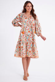 Model Madeline wearing size S of the Molly Dress in colour Woodstock (White), from the front, showing the whole outfit