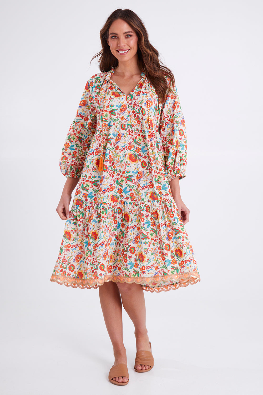 Model Madeline wearing size S of the Molly Dress in colour Woodstock (White), from the front, showing the whole outfit