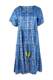 Product shot of the Libra Dress in colour Patolablue (Blue), from the front