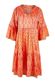 Product shot of the Belmont Dress in colour Coralpatch (Pink), from the front