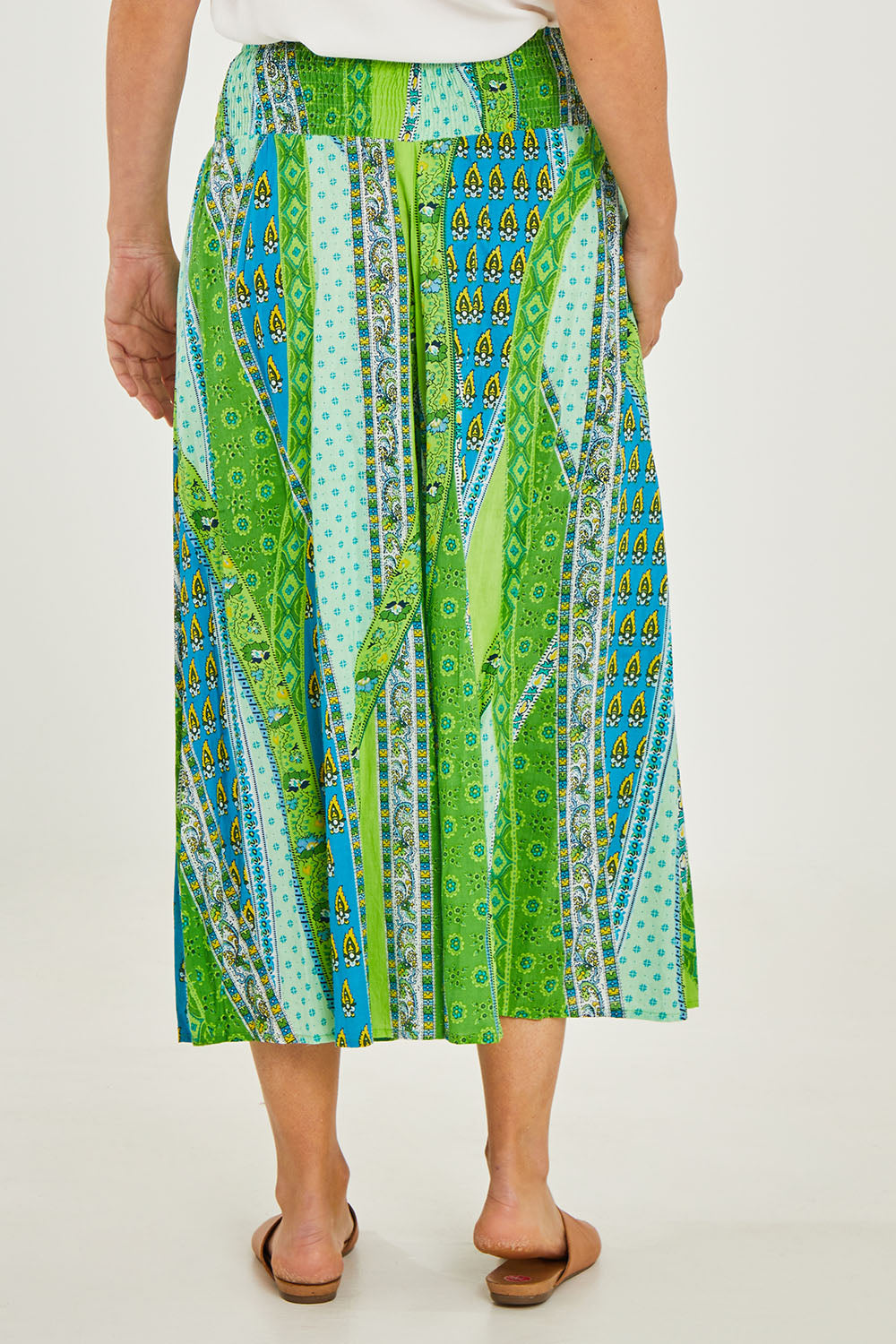 Model Georgia wearing size S of the Hendrix Pants in colour Mauiaqua (Green), from the back