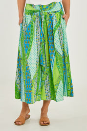 Model Georgia wearing size S of the Hendrix Pants in colour Mauiaqua (Green), from the front, cropped image