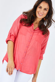 Model Shadae wearing size S of the Marina Shirt in colour Watermelon (Pink), from the front, cropped image