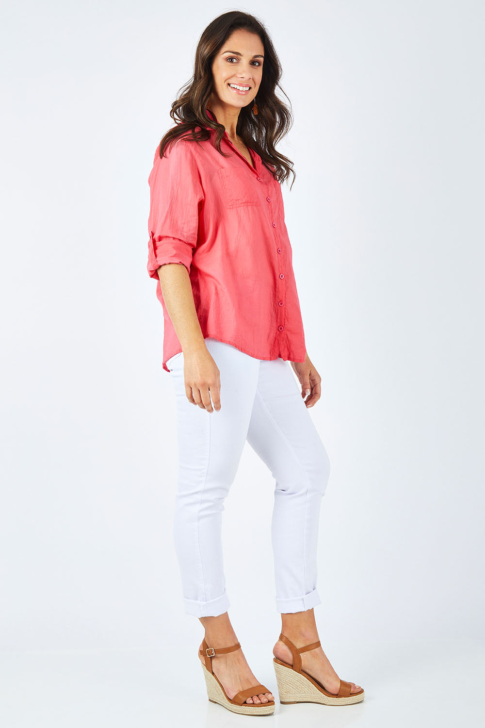 Model Shadae wearing size S of the Marina Shirt in colour Watermelon (Pink), from the front, showing the whole outfit