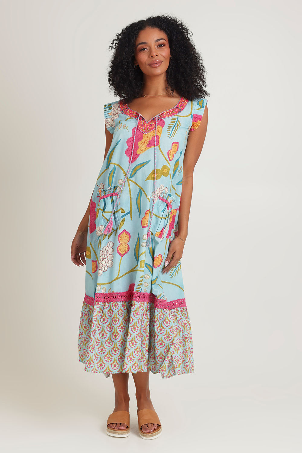 Model Ziara wearing size S of the Epson Maxi Dress in colour Avalon (Blue), from the front, showing the whole outfit