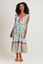 Model Ziara wearing size S of the Epson Maxi Dress in colour Avalon (Blue), from the front, showing the whole outfit