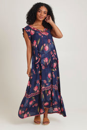 Model Ziara wearing size S of the Epson Maxi Dress in colour Frolic (Blue), from the front, showing the whole outfit