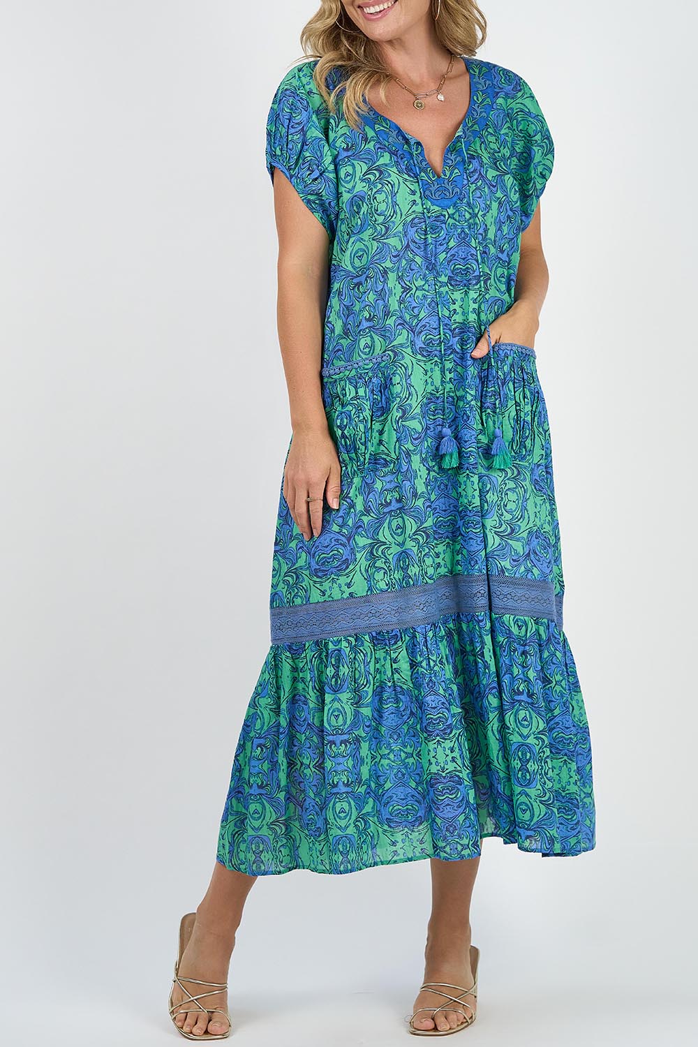 A model wearing the Sao Paulo Cotton Maxi Dress in colour Alessiablu (Blue), from the front, cropped image