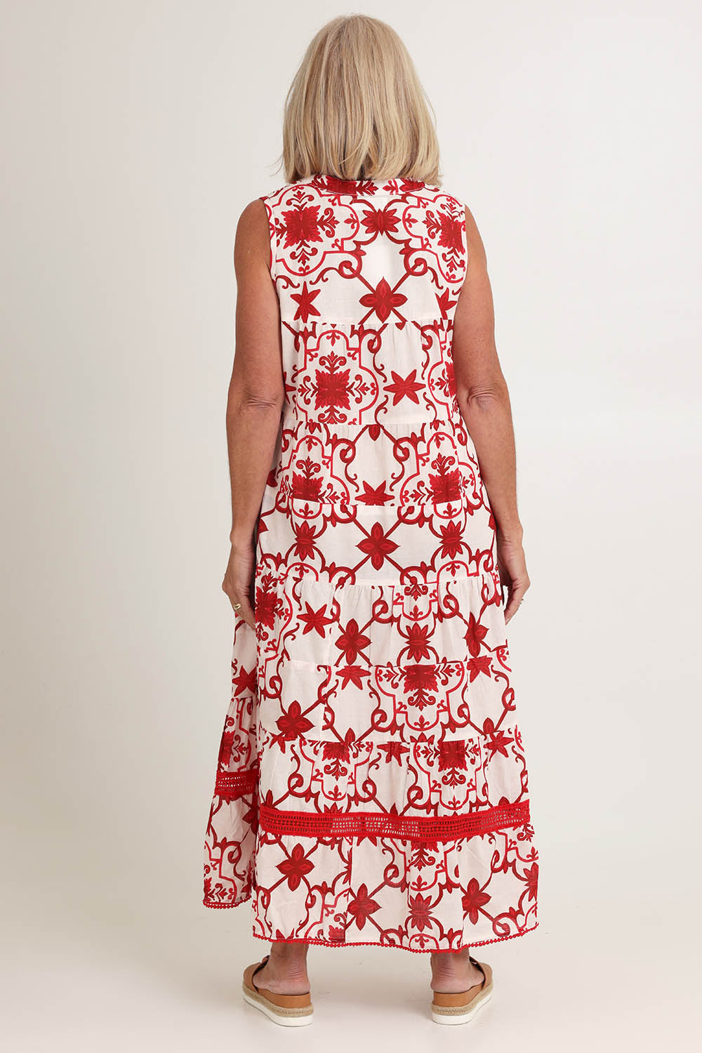 Model Sandy wearing size S of the Lulu Cotton Maxi Dress in colour Jemmared (Red), from the back